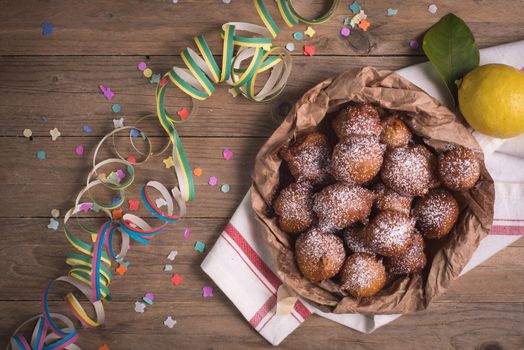 Fried carnival italian dessert in carnival top view composition