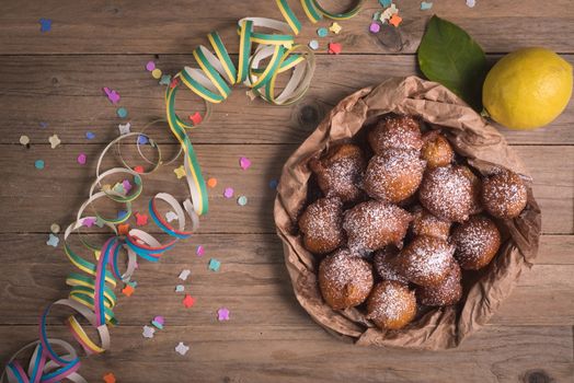 Fried carnival italian dessert in carnival top view composition