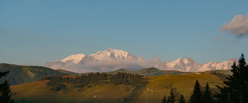 Romantic evening landscape in French Alps in summer