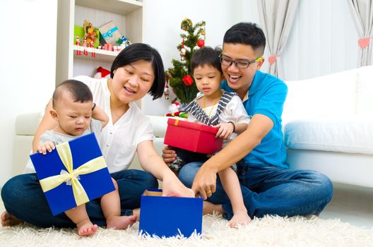 Portrait of happy family members on Christmas eve