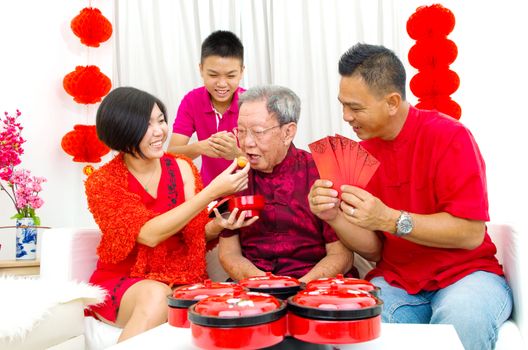 Asian three generations family celebrate chinese new year