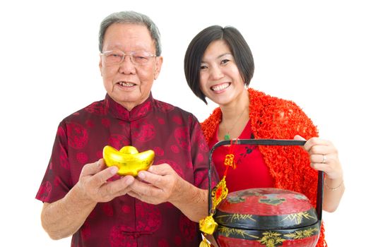 Asian senior man and his daughter celebrate chinese new year