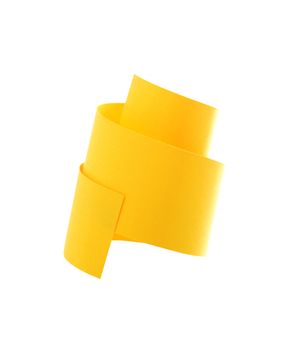 Abstract spiral made from yellow paper. Isolated on white with clipping path