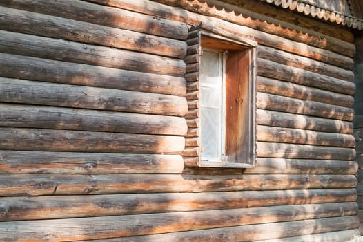 The wooden window in an old house from a frame