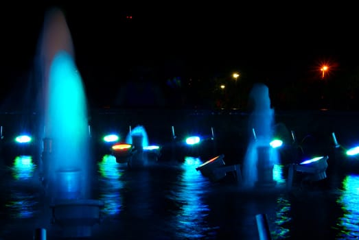 Close view details of the fountain at night, various lighting decoration