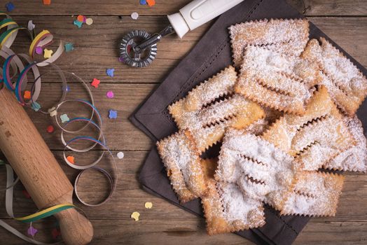 Fried carnival italian dessert in carnival top view composition