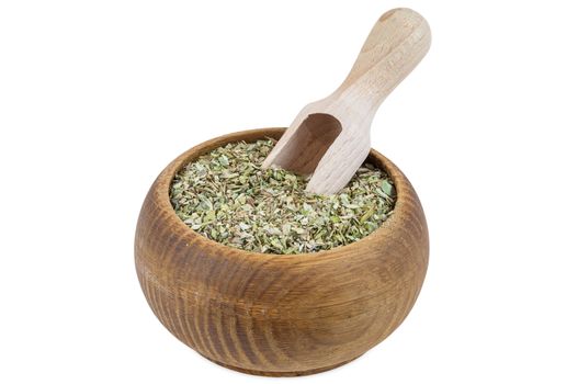 Portion of oregano spice in wooden bowl isolated on white background with clipping path