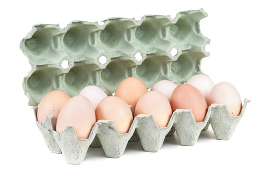 Eggs in carton box isolated on white background with clipping path