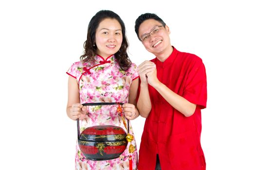 lovely chinese couple celebrating chinese new year