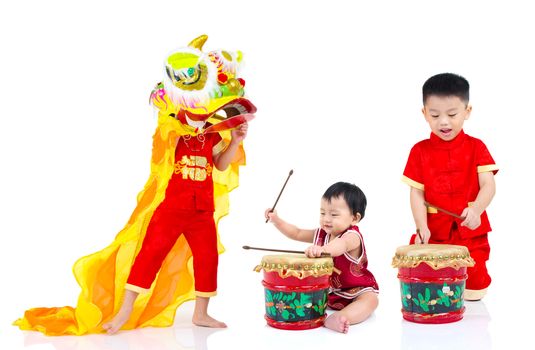 Asian Chinese kids in traditional Chinese cheongsam celebrating chinese new year , isolated on white background.