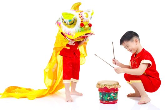 Asian Chinese kids in traditional Chinese cheongsam celebrating chinese new year , isolated on white background.