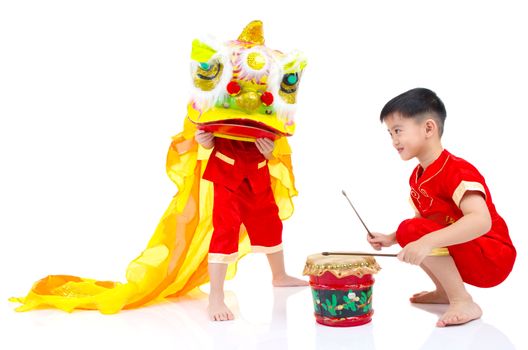 Asian Chinese kids in traditional Chinese cheongsam celebrating chinese new year , isolated on white background.