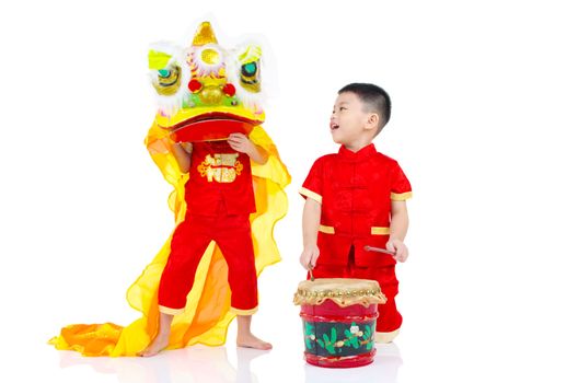 Asian Chinese kids in traditional Chinese cheongsam celebrating chinese new year , isolated on white background.