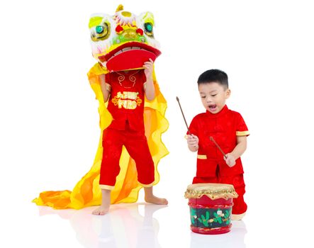 Asian Chinese kids in traditional Chinese cheongsam celebrating chinese new year , isolated on white background.