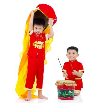 Asian Chinese kids in traditional Chinese cheongsam celebrating chinese new year , isolated on white background.