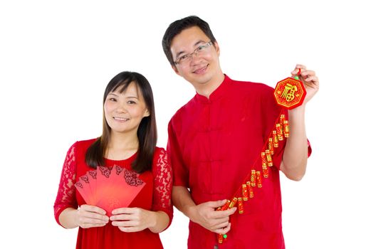 Asian couple celebrating chinese new year