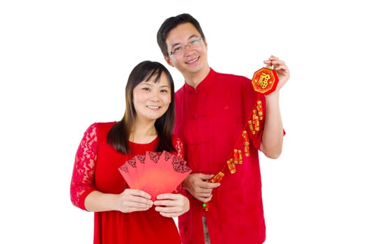 Asian couple celebrating chinese new year