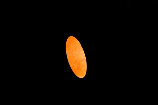 beautiful oval red fireball on a black background