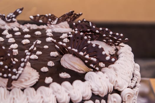 delicious chocolate cake decorated with colorful decorations