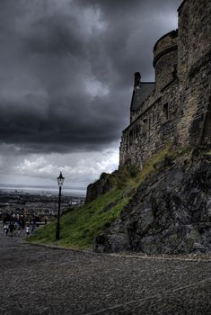 Dramatic view of clouds over walls of Edinburgh castle