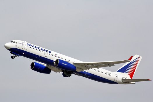 MOSCOW, RUSSIA - MAY 10, 2013: Transaero Tupolev Tu-214 takes off Domodedovo International Airport.