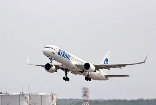 MOSCOW, RUSSIA - MAY 10, 2013: UTair Boeing 757 takes off the Domodedovo International Airport.
