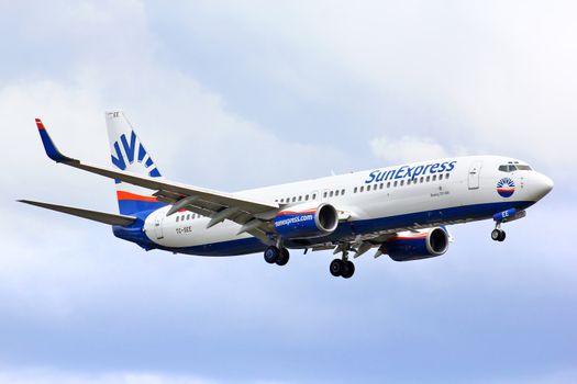 BERLIN, GERMANY - AUGUST 17, 2014: SunExpress Boeing 737 arrives to the Tegel International Airport.