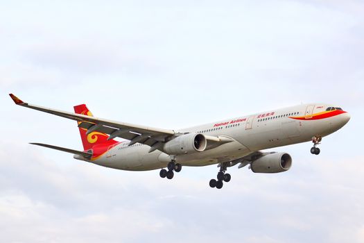 BERLIN, GERMANY - AUGUST 17, 2014: Hainan Airlines Airbus A330 arrives to the Tegel International Airport.