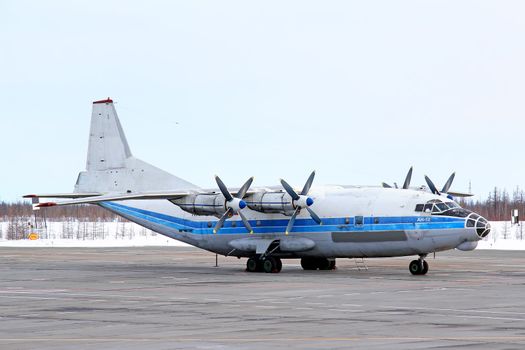NOVYY URENGOY, RUSSIA - APRIL 8, 2015: Kosmos Aviation Antonov An-12B at the Novyy Urengoy International Airport.