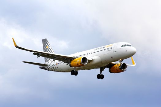 BERLIN, GERMANY - AUGUST 17, 2014: Vueling Airlines Airbus A320 arrives to the Tegel International Airport.