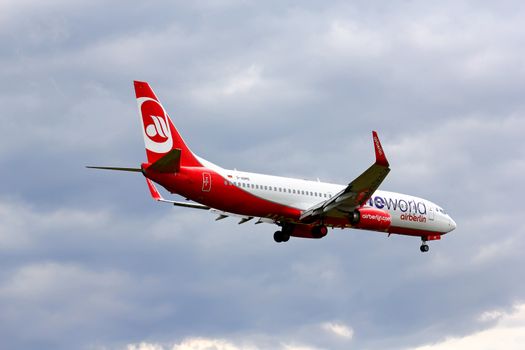 BERLIN, GERMANY - AUGUST 17, 2014: Air Berlin Boeing 737 arrives to the Tegel International Airport.