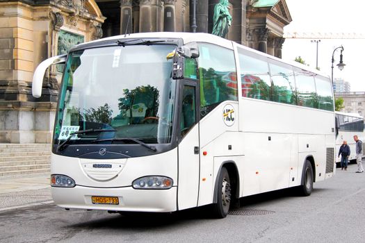 BERLIN, GERMANY - SEPTEMBER 12, 2013: White Irizar Century interurban coach at the city street.