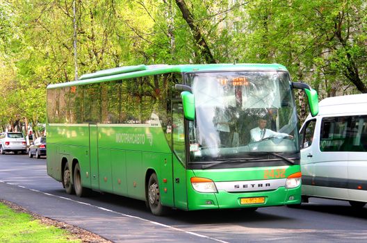 MOSCOW, RUSSIA - MAY 6, 2012: Green Setra S417GT-HD interurban coach at the city street.