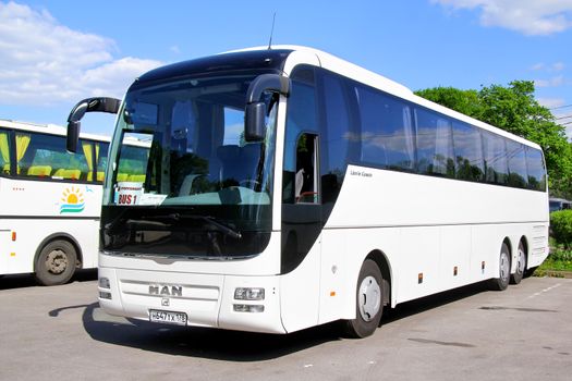 PETERGOF, RUSSIA - MAY 27, 2013: White MAN R08 Lion's Top Coach interurban bus at the bus station.