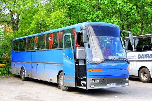 PETERGOF, RUSSIA - MAY 27, 2013: Blue Bova Futura interurban coach at the city street.