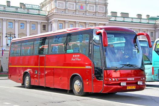 SAINT PETERSBURG, RUSSIA - MAY 25, 2013: Red Noge Domino 2001HDH interurban coach at the city street.