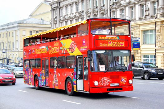 MOSCOW, RUSSIA - JUNE 2, 2013: MAN SD200 city sightseeing bus of the City Sightseeing Moscow bus company at the city street.