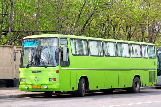 MOSCOW, RUSSIA - MAY 5, 2012: Green Mercedes-Benz O303 interurban coach at the city street.