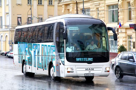 MOSCOW, RUSSIA - JUNE 3, 2012: White MAN R07 Lion's Coach interurban coach at the city street.