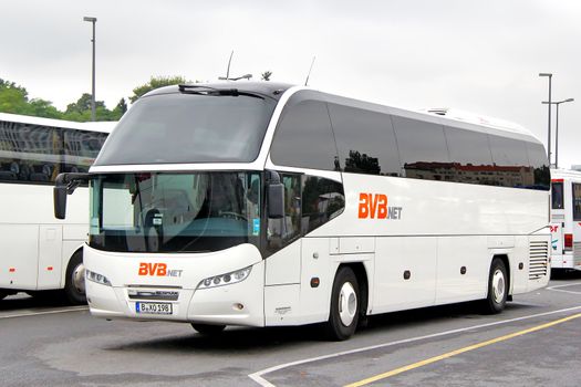 BERLIN, GERMANY - SEPTEMBER 12, 2013: White Neoplan N1216HD Cityliner coach of Bus-Verkehr-Berlin KG bus company at the bus station.