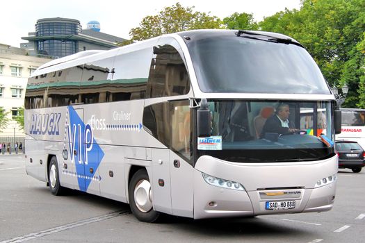 BERLIN, GERMANY - SEPTEMBER 12, 2013: Grey Neoplan N1216HD Cityliner interurban coach at the city street.