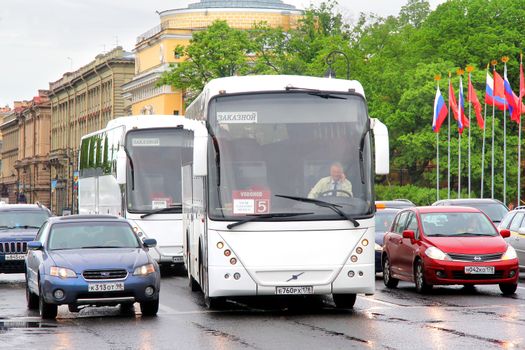 SAINT PETERSBURG, RUSSIA - MAY 26, 2013: White Jonckheere Arrow interurban coaches at the city street.