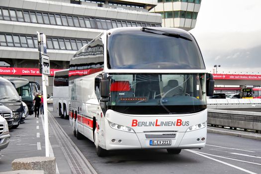 BERLIN, GERMANY - SEPTEMBER 9, 2013: White Neoplan N1216HD Cityliner interurban coach at the city street.