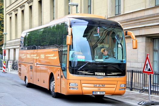 BERLIN, GERMANY - SEPTEMBER 12, 2013: Brown MAN R07 Lion's Coach interurban coach at the city street.