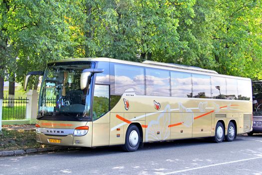 SUZDAL, RUSSIA - AUGUST 23, 2011: Golden Setra S417GT-HD interurban coach at the city street.