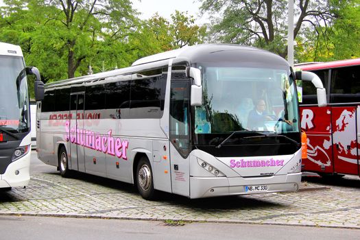 BERLIN, GERMANY - SEPTEMBER 11, 2013: Grey Neoplan N3516U Trendliner interurban coach at the city street.