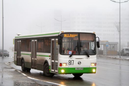 NOVYY URENGOY, RUSSIA - OCTOBER 14, 2012: Green LIAZ 5293 city bus at the city street.