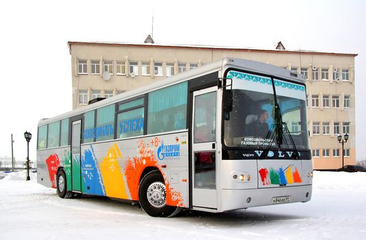 NOVYY URENGOY, RUSSIA - MARCH 2, 2014: Grey Saffle interurban coach at the bus station.