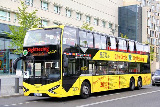 BERLIN, GERMANY - SEPTEMBER 12, 2013: Viseon LDD 14 city sightseeing bus of Berliner Baeren Stadtrundfahrt GmbH bus company at the city street.