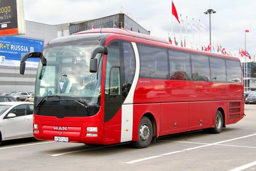 MOSCOW, RUSSIA - SEPTEMBER 29, 2012: Red MAN R07 Lion's Coach interurban coach at the city street.